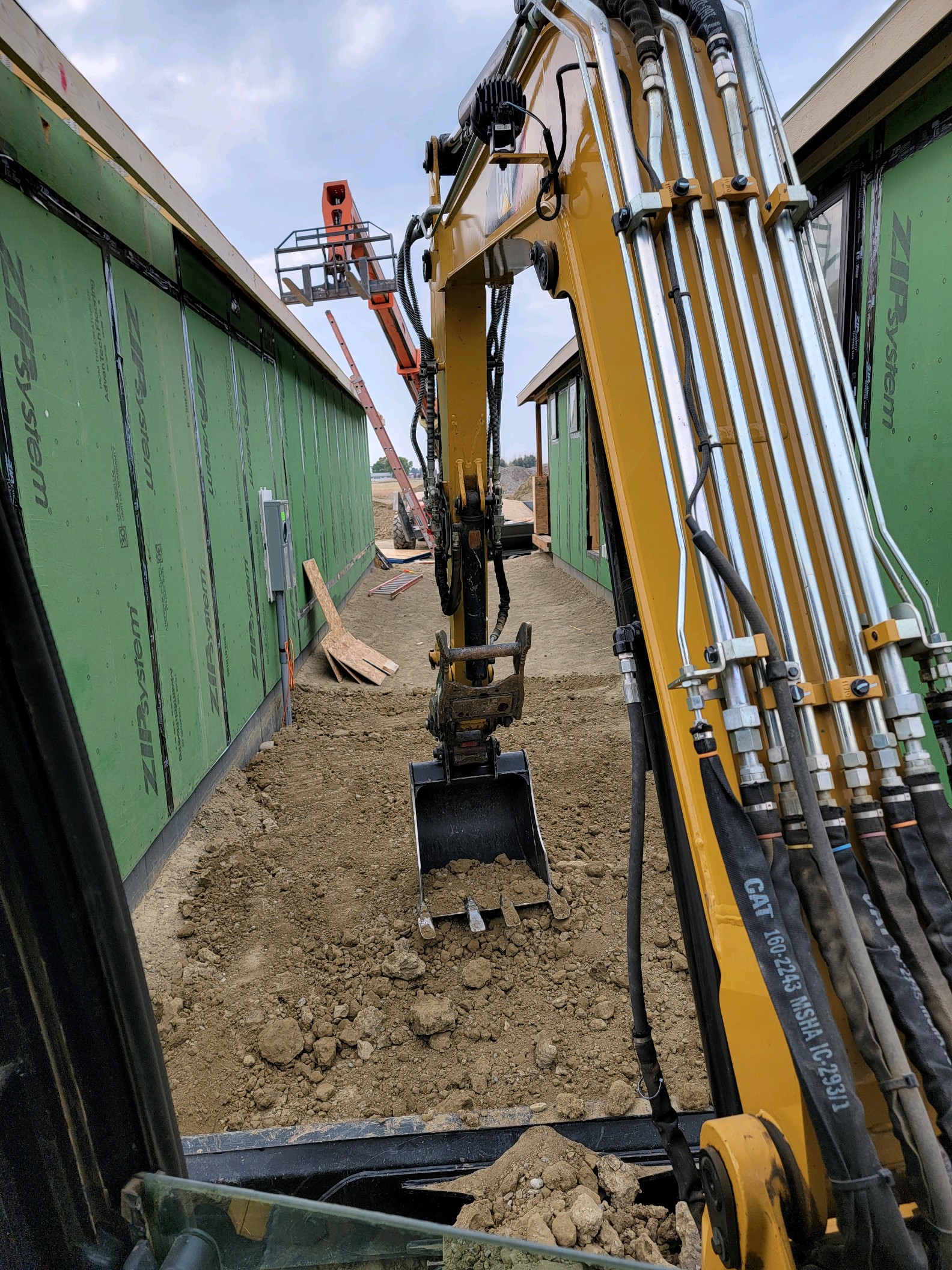 Construction site with machinery and workers
