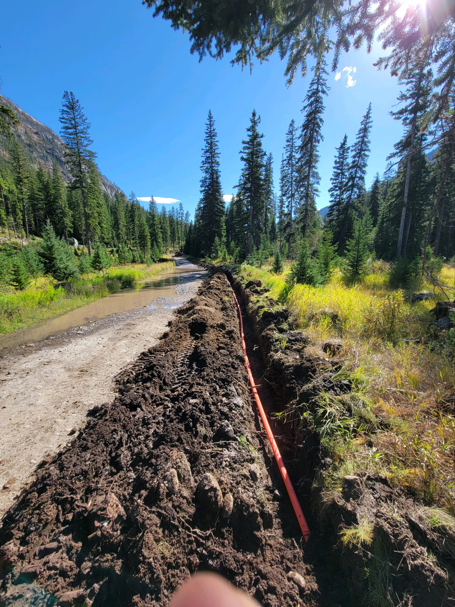 Trenching for underground utilities